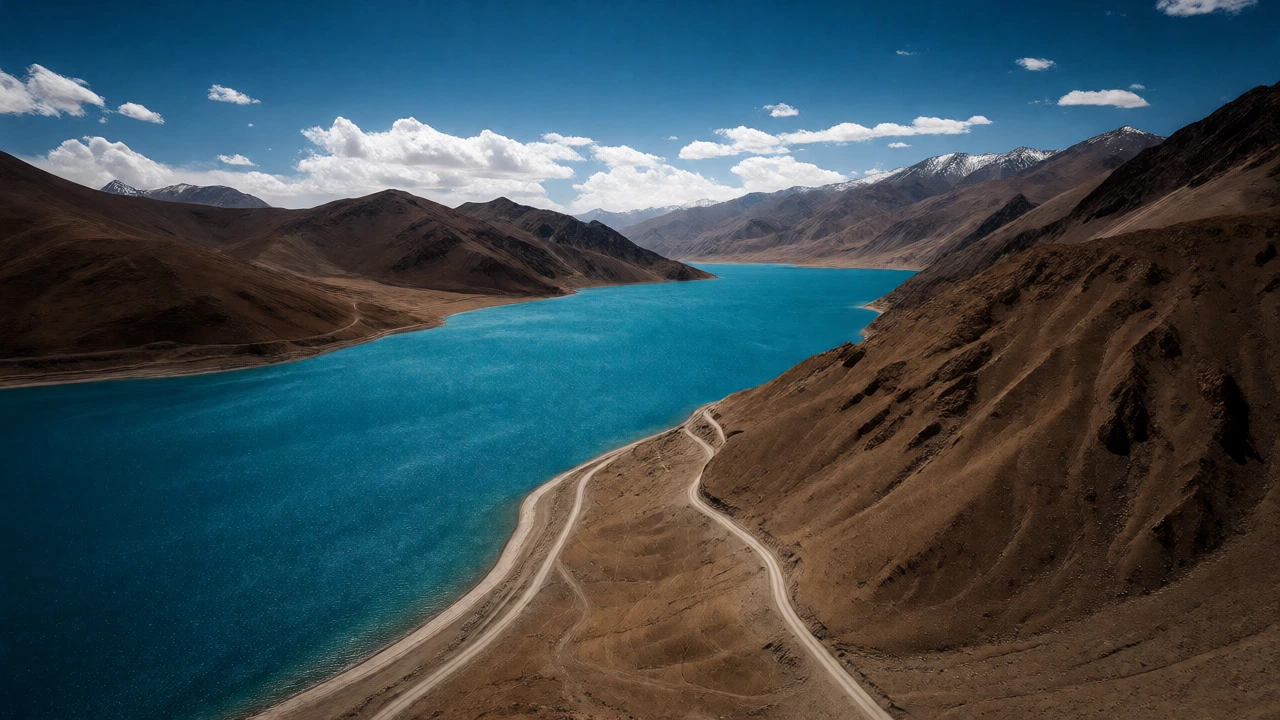 Turquoise Pangong Tso lake surrounded by barren Ladakh mountains